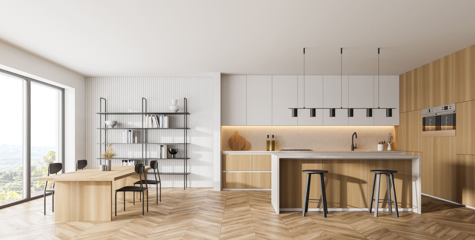 Modern kitchen with light wood cabinets, a long island with bar stools, and black pendant lights