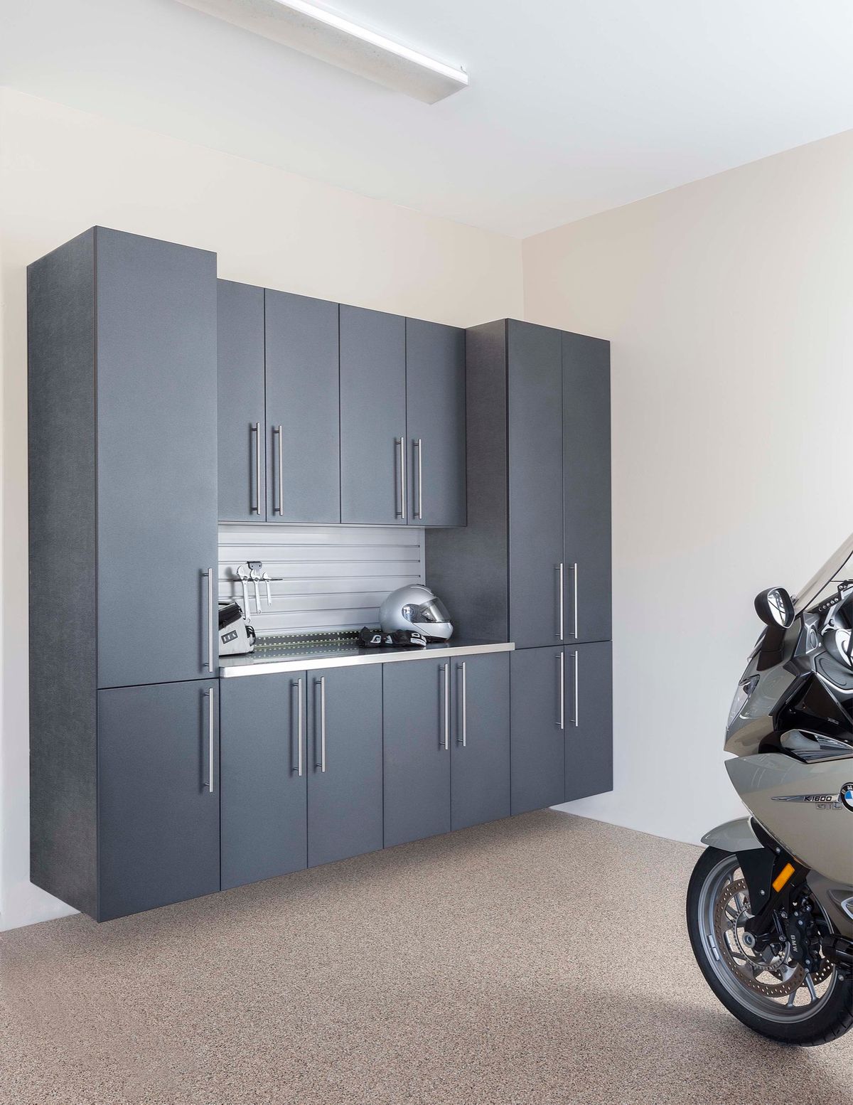 Granite Cabinet Stainless Counter with Gray Slatwall Motorcycle Angle Door Closed Feb 2013.jpg