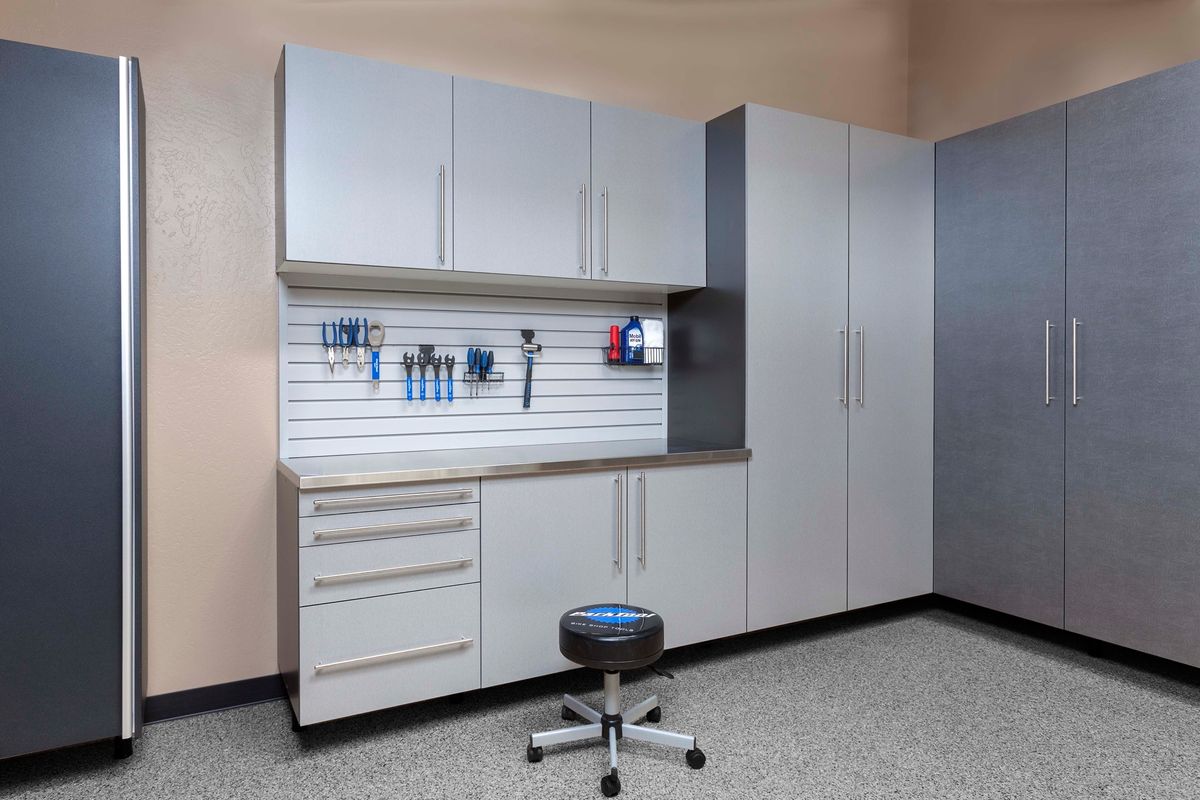 Silver next to Pewter Stianless Workbench with Gray Slatwall fewer props Smoke Floor Feb 2013.jpg