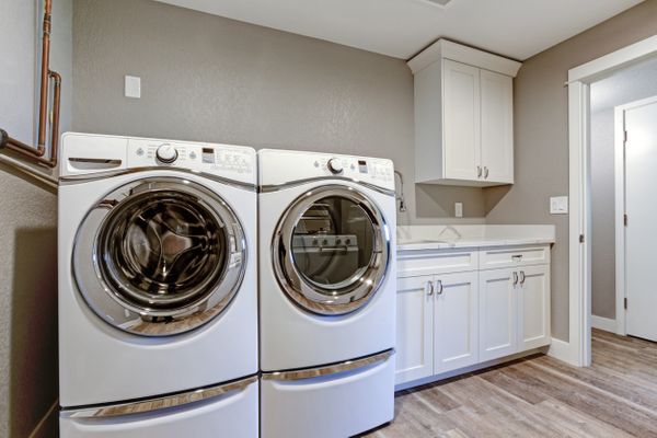 Custom Laundry Room with White Cabinets, Omaha