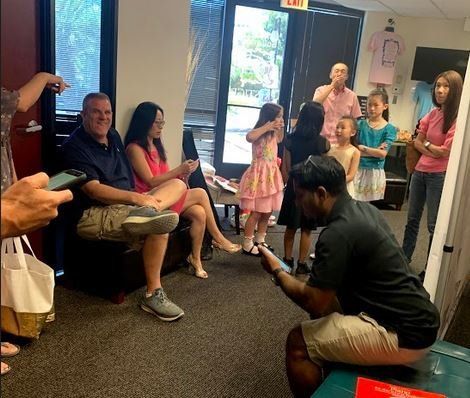 Parents and performers excitedly awaiting their turn in the lobby