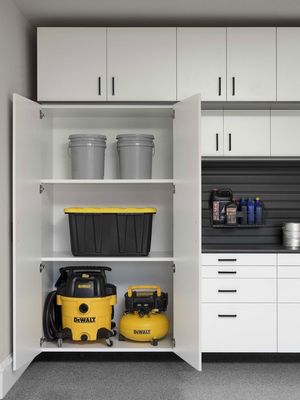 white-cabinets-with-ebony-star-workbench-open-doors-feb-2021.jpg