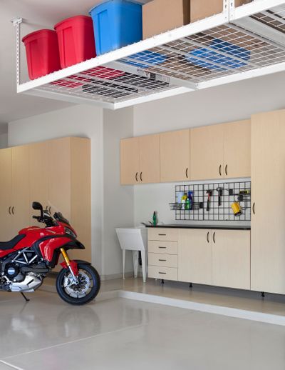 Maple-Cabinets-Ebony-Star-Workbench-Overhead-Storage-Motorcycle-Angle-2012.jpg