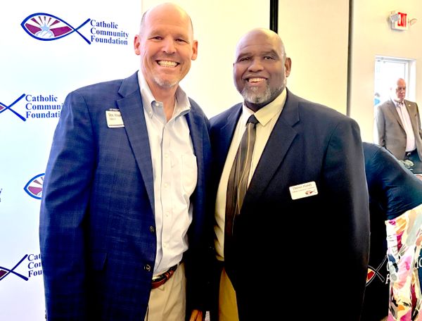 CCF Community Engagement Advisor Darren Handy with a guest at the Donor Appreciation event