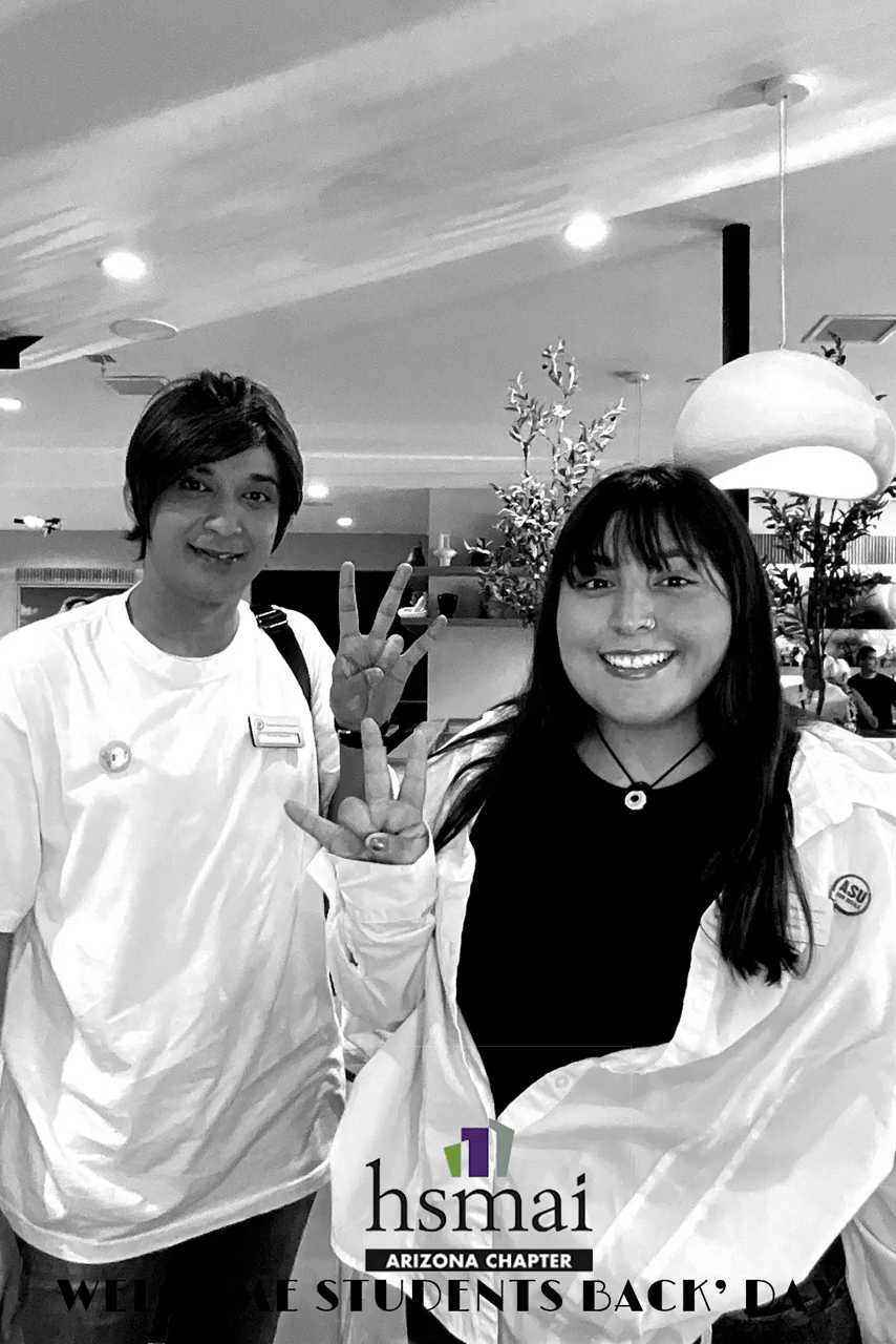 Two Attendees Smiling at HSMAI Arizona Welcome Back Day Event