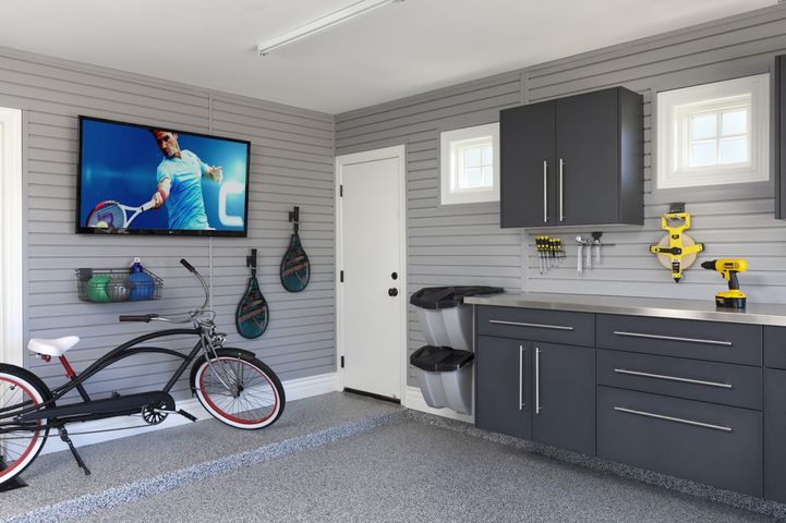 Granite Workbench-Stainless Counter-Grey Slatwall with TV HandiNet-Bike-Smoke Floor-Arcadia 2013.jpg